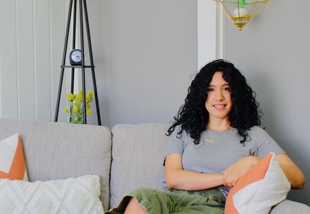 Anaisa Lua sits in her office