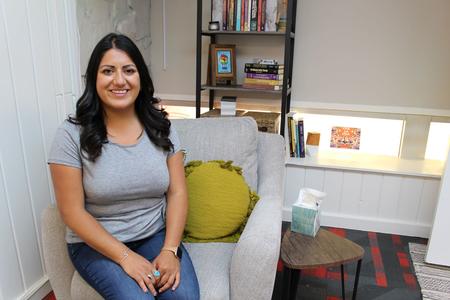 Picture of Neva Martinez Ortega sitting in her office. 